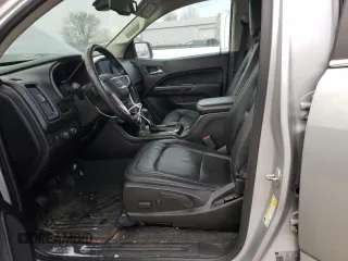 2019 GMC Canyon 4WD SLT with VIN 1GTG6DEN7K1134168, listed as a Copart auction lot 86510834 with 61,889 mi miles and Salvage Title. Bid and sale history available at carsss.com. Image 7.