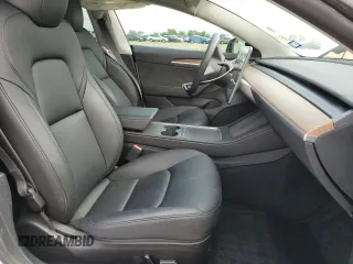 2023 Tesla Model 3 с VIN 5YJ3E1EA1PF600656, выставлен на аукционе Copart как лот 54887235 с пробегом 29 275 миль миль и Списание • Salvage title. История ставок и продаж доступна на DreamBid. Изображение 7.