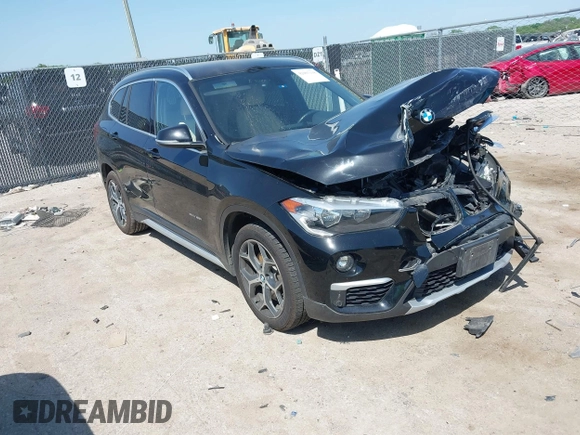 2017 BMW X1 sDrive28i z VIN WBXHU7C31H5H33748, wystawiony jako IAAI lot #42003198 z przebiegiem 71 274 mil mil oraz . Historia ofert i sprzedaży dostępna na DreamBid. Obrazek 1.