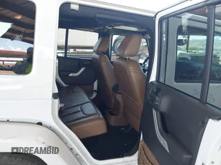 2016 Jeep Wrangler Unlimited Sahara with VIN 1C4BJWEG0GL126270, listed as a IAAI auction lot 42229364 with 50,847 mi miles and . Bid and sale history available at DreamBid. Image 8.