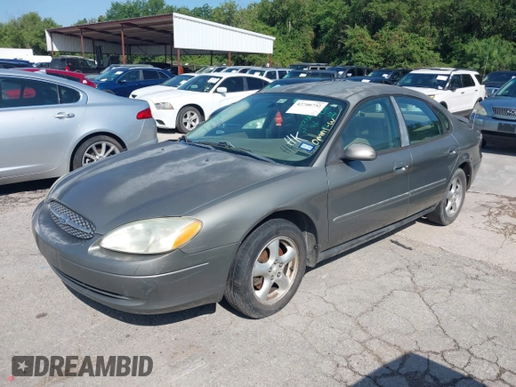 2003 Ford Taurus SE Standard z VIN 1FAFP53UX3A228383, wystawiony jako IAAI lot #42700752 z przebiegiem 182 598 mil mil oraz . Historia ofert i sprzedaży dostępna na DreamBid. Obrazek 2.