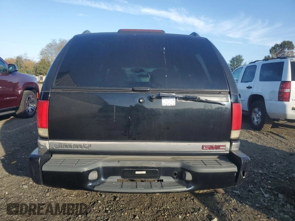 1998 GMC Jimmy SLE with VIN 1GKDT13W6W2543854, listed as a Copart auction lot 76004664 with 157,457 mi miles and Salvage Title. Bid and sale history available at carsss.com. Image 6.