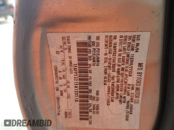 2005 Ford Taurus SE with VIN 1FAFP53215A133518, listed as a Copart auction lot 59615205 with 127,778 mi miles and Salvage title. Bid and sale history available at DreamBid. Image 12.
