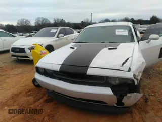 2013 Dodge Challenger SXT z VIN 2C3CDYAG0DH648813, wystawiony jako IAAI lot #41480699 z przebiegiem 154 665 mil mil oraz . Historia ofert i sprzedaży dostępna na DreamBid. Obrazek 11.
