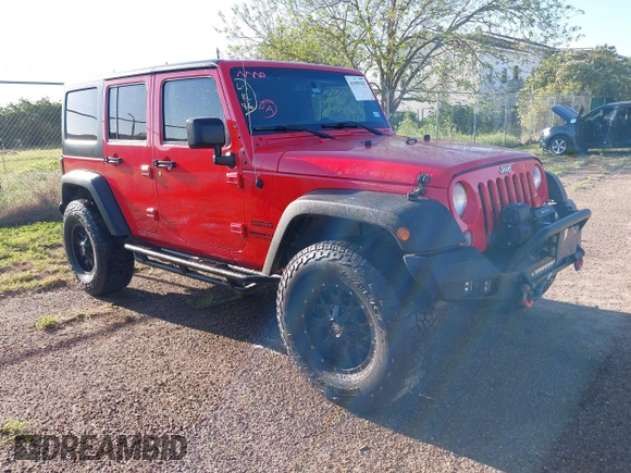 2015 Jeep Wrangler Unlimited Willys Wheeler with VIN 1C4BJWDG0FL635341, listed as a IAAI auction lot 41955393 with 145,529 mi miles and . Bid and sale history available at DreamBid. Image 1.