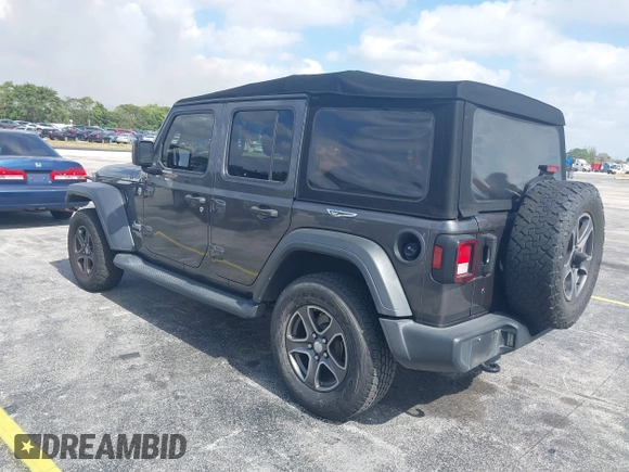 2018 Jeep Wrangler Unlimited Sport S z VIN 1C4HJXDGXJW165312, wystawiony jako IAAI lot #42095590 z przebiegiem 90 598 mil mil oraz . Historia ofert i sprzedaży dostępna na DreamBid. Obrazek 3.