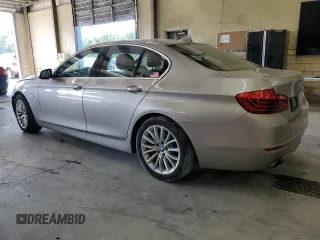 2016 BMW 5 Series 528i with VIN WBA5A5C54GD529359, listed as a Copart auction lot 61907235 with 111,621 mi miles and Salvage title. Bid and sale history available at DreamBid. Image 2.