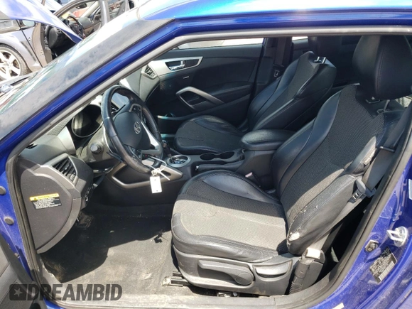 2012 Hyundai Veloster w/Red Int with VIN KMHTC6AD2CU048049, listed as a Copart auction lot 63796274 with 122,914 mi miles and Salvage title. Bid and sale history available at DreamBid. Image 7.