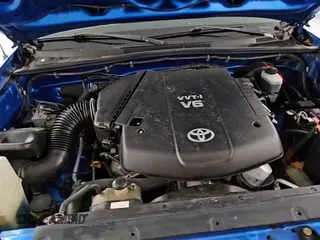2005 Toyota Tacoma PreRunner с VIN 3TMJU62N05M002100, выставлен на аукционе Copart как лот 84837805 с пробегом 300 227 миль миль и Чистый • Clean title. История ставок и продаж доступна на DreamBid. Изображение 14.