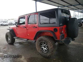 2018 Jeep Wrangler JK Unlimited Sport S with VIN 1C4HJWDG0JL897721, listed as a Copart auction lot 82472104 with 0 mi miles and Salvage Title. Bid and sale history available at carsss.com. Image 2.