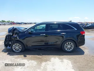 2016 Kia Sorento LX with VIN 5XYPGDA50GG012567, listed as a IAAI auction lot 42074624 with 107,605 mi miles and . Bid and sale history available at DreamBid. Image 14.