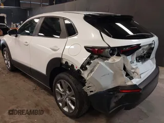2021 Mazda CX-30 Preferred z VIN 3MVDMBCL2MM210902, wystawiony jako IAAI lot #42522203 z przebiegiem 42 995 mil mil oraz . Historia ofert i sprzedaży dostępna na DreamBid. Obrazek 6.