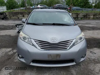 2015 Toyota Sienna Limited with VIN 5TDDK3DC5FS118715, listed as a Copart auction lot 55957215 with 133,500 mi miles and Salvage title. Bid and sale history available at DreamBid. Image 5.