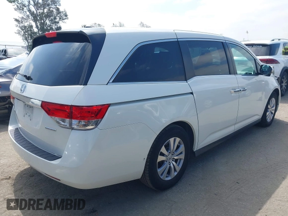 2016 Honda Odyssey SE with VIN 5FNRL5H33GB043303, listed as a IAAI auction lot 42215233 with 67,097 mi miles and . Bid and sale history available at DreamBid. Image 4.