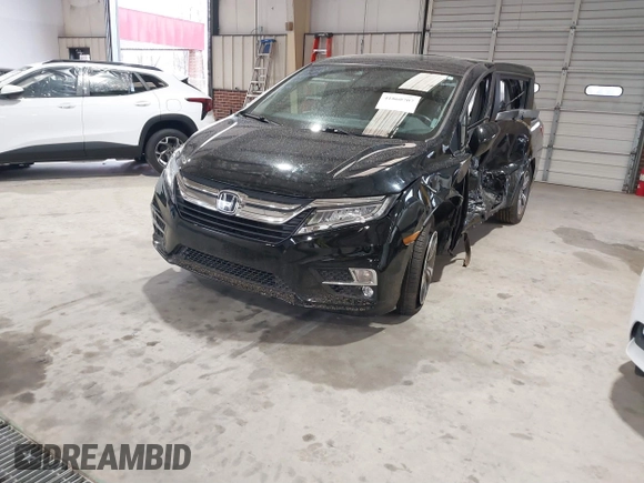 2018 Honda Odyssey Touring with VIN 5FNRL6H87JB105410, listed as a IAAI auction lot 41860707 with 91,908 mi miles. Bid and sale history available at carsss.com. Image 20.