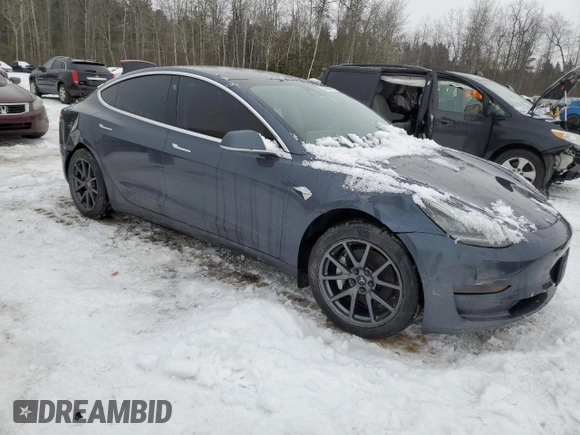 2019 Tesla Model 3 Mid Range with VIN 5YJ3E1EA1KF528950, listed as a Copart auction lot 43344475 with 57,272 mi miles and Clean Title. Bid and sale history available at DreamBid. Image 4.