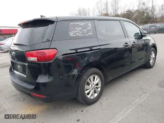 2016 Kia Sedona L with VIN KNDMA5C15G6168708, listed as a IAAI auction lot 41695088 with 105,364 mi miles. Bid and sale history available at carsss.com. Image 4.