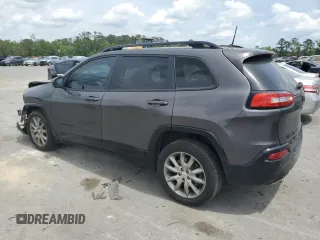 2018 Jeep Cherokee Latitude with VIN 1C4PJLCX0JD587753, listed as a Copart auction lot 54054545 with 128,194 mi miles and Salvage Title. Bid and sale history available at DreamBid. Image 2.