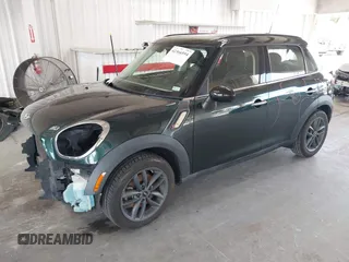 2013 MINI Countryman S with VIN WMWZC3C56DWP24170, listed as a IAAI auction lot 42366594 with 143,311 mi miles and . Bid and sale history available at DreamBid. Image 18.