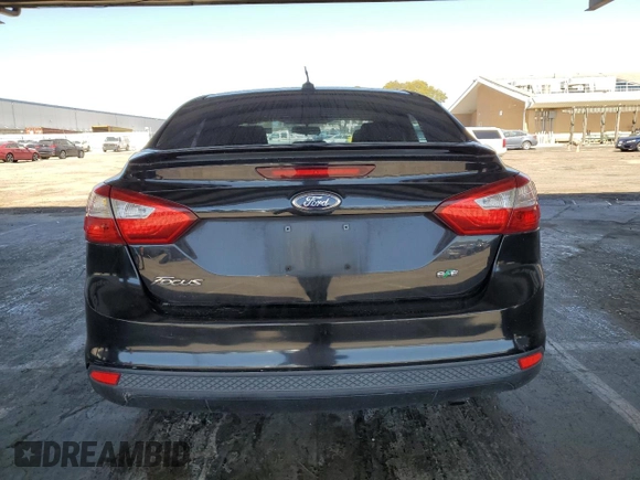 2012 Ford Focus SE with VIN 1FAHP3F25CL293041, listed as a Copart auction lot 58069955 with 127,129 mi miles and Salvage title. Bid and sale history available at DreamBid. Image 6.