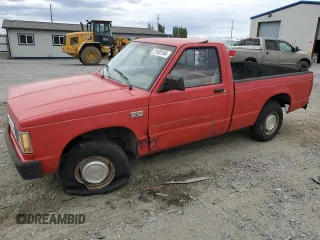 1988 GMC Sonoma with VIN 1GTBS14E2J2539806, listed as a Copart auction lot 71105184 with 141,085 mi miles and Salvage Title. Bid and sale history available at DreamBid. Image 1.