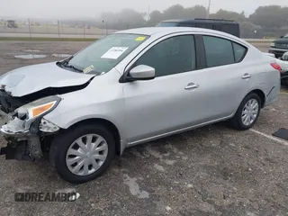 2015 Nissan Versa S Plus with VIN 3N1CN7AP0FL810844, listed as a IAAI auction lot 41386594 with 118,606 mi miles. Bid and sale history available at carsss.com. Image 2.