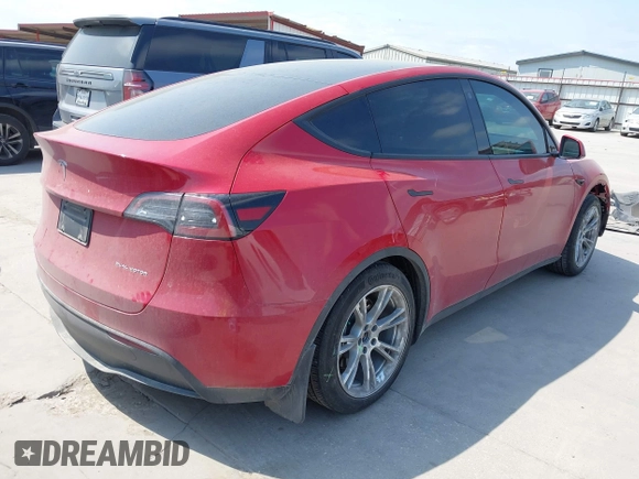 2023 Tesla Model Y Long Range z VIN 7SAYGAEE7PF691499, wystawiony jako IAAI lot #42038850 z przebiegiem 26 439 mil mil oraz . Historia ofert i sprzedaży dostępna na DreamBid. Obrazek 4.