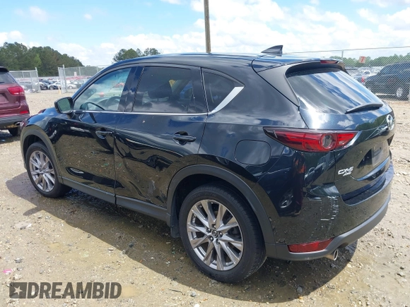 2019 Mazda CX-5 Grand Touring with VIN JM3KFBDM7K0518603, listed as a IAAI auction lot 39185478 with 42,805 mi miles. Bid and sale history available at carsss.com. Image 14.