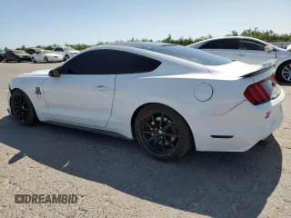 2016 Ford Mustang GT with VIN 1FA6P8CF9G5261392, listed as a Copart auction lot 61004015 with 102,933 mi miles and Salvage title. Bid and sale history available at DreamBid. Image 2.