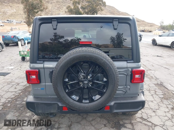 2021 Jeep Wrangler Unlimited Sahara with VIN 1C4JJXP64MW720263, listed as a IAAI auction lot 41514302 with 73,300 mi miles and . Bid and sale history available at DreamBid. Image 17.