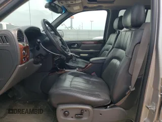2004 GMC Envoy SLT with VIN 1GKDT13S842439635, listed as a Copart auction lot 63317194 with 201,672 mi miles and Salvage Title. Bid and sale history available at carsss.com. Image 7.