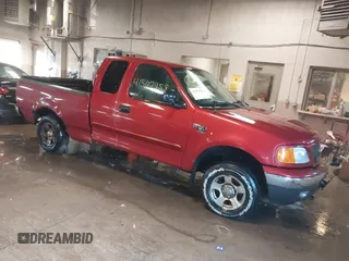 2004 Ford F-150 XL with VIN 2FTRX18W74CA40690, listed as a IAAI auction lot 41507958 with 182,136 mi miles and . Bid and sale history available at DreamBid. Image 1.