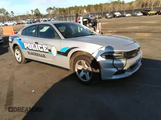 2019 Dodge Charger Police z VIN 2C3CDXAT7KH688603, wystawiony jako IAAI lot #35436234 z przebiegiem 60 213 mil mil oraz . Historia ofert i sprzedaży dostępna na DreamBid. Obrazek 1.