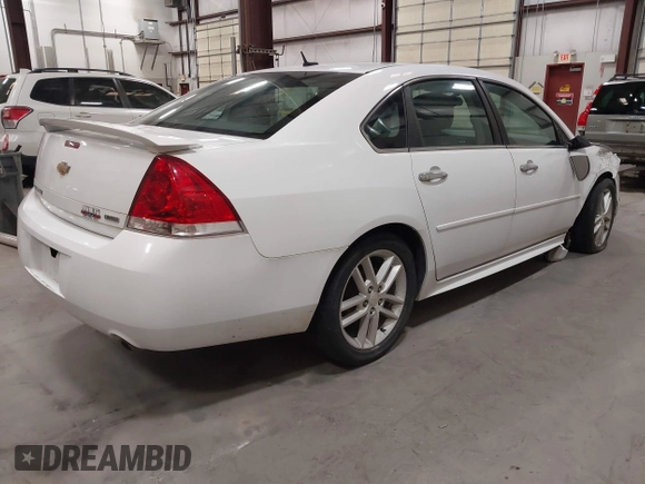 2014 Chevrolet Impala LTZ with VIN 2G1WC5E35E1188410, listed as a IAAI auction lot 42473631 with Not provided miles and . Bid and sale history available at DreamBid. Image 4.