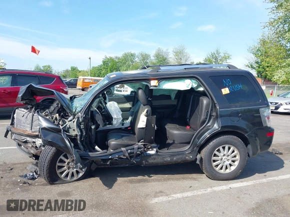 2011 Mercury Mariner Premier with VIN 4M2CN9HG7BKJ01459, listed as a IAAI auction lot 42231597 with 168,362 mi miles and . Bid and sale history available at DreamBid. Image 14.