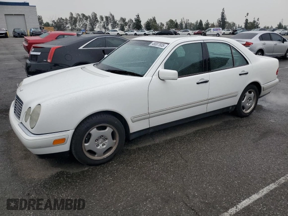 1997 Mercedes-Benz E-Class with VIN WDBJF72F2VA099305, listed as a Copart auction lot 48007935 with 96,410 mi miles and Salvage Title. Bid and sale history available at carsss.com. Image 1.