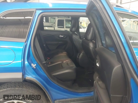 2020 Jeep Cherokee Trailhawk with VIN 1C4PJMBX6LD656570, listed as a IAAI auction lot 42399597 with 88,348 mi miles and . Bid and sale history available at DreamBid. Image 8.
