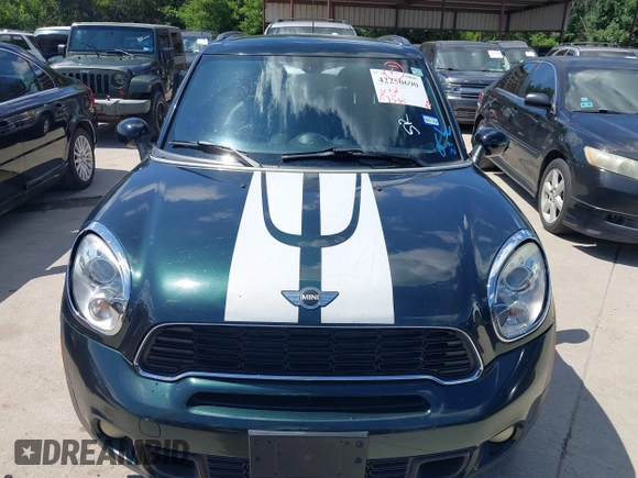 2011 MINI Countryman S with VIN WMWZC5C53BWM10484, listed as a IAAI auction lot 42250690 with 113,534 mi miles and . Bid and sale history available at DreamBid. Image 6.