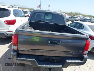 2018 Toyota Tacoma SR with VIN 5TFCZ5AN6JX127774, listed as a IAAI auction lot 41801158 with 28,161 mi miles and . Bid and sale history available at DreamBid. Image 2.