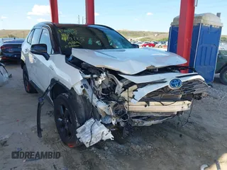 2021 Toyota RAV4 Hybrid XSE with VIN 2T3E6RFV9MW019837, listed as a IAAI auction lot 42002574 with 74,214 mi miles. Bid and sale history available at carsss.com. Image 1.