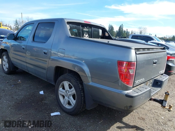 2009 Honda Ridgeline RTL with VIN 5FPYK16599B100707, listed as a IAAI auction lot 41877598 with 130,622 mi miles and . Bid and sale history available at DreamBid. Image 3.