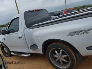 2003 Ford F-150 with VIN 2FTRF07W43CA38120, listed as a IAAI auction lot 41944774 with 195,327 mi miles and . Bid and sale history available at DreamBid. Image 14.
