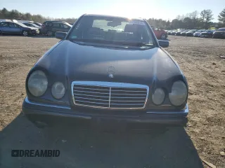 1996 Mercedes-Benz E Class with VIN WDBJF20F5TJ021801, listed as a Copart auction lot 80188074 with 196,397 mi miles and Salvage Title. Bid and sale history available at carsss.com. Image 5.