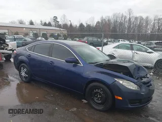 2009 Mazda 6 i Sport with VIN 1YVHP81H795M50188, listed as a IAAI auction lot 41073403 with 262,603 mi miles. Bid and sale history available at carsss.com. Image 1.