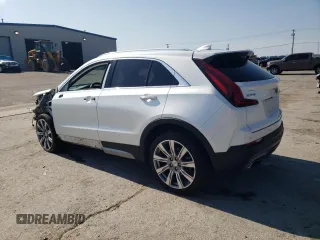 2020 Cadillac XT4 FWD Premium Luxury with VIN 1GYFZCR4XLF101193, listed as a Copart auction lot 59968145 with 135,218 mi miles and Salvage title. Bid and sale history available at DreamBid. Image 2.