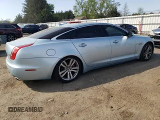 2013 Jaguar XJ Portfolio with VIN SAJWJ2GD3D8V47879, listed as a Copart auction lot 54558195 with 99,500 mi miles and Clean Title. Bid and sale history available at DreamBid. Image 3.