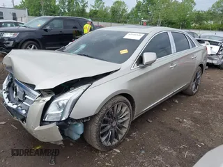 2014 Cadillac XTS Platinum z VIN 2G61T5S31E9209179, wystawiony jako IAAI lot #42241440 z przebiegiem 79 651 mil mil oraz . Historia ofert i sprzedaży dostępna na DreamBid. Obrazek 17.