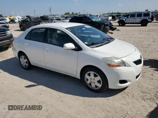 2009 Toyota Yaris z VIN JTDBT903X91338995, wystawiony jako Copart lot #50552035 z przebiegiem 133 279 mil mil oraz Tytuł czysty. Historia ofert i sprzedaży dostępna na DreamBid. Obrazek 4.