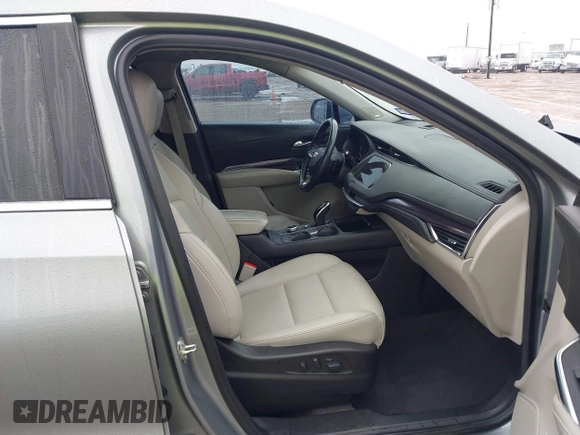 2023 Cadillac XT4 FWD Luxury with VIN 1GYAZAR49PF170591, listed as a IAAI auction lot 41283893 with 33,661 mi miles and . Bid and sale history available at carsss.com. Image 5.