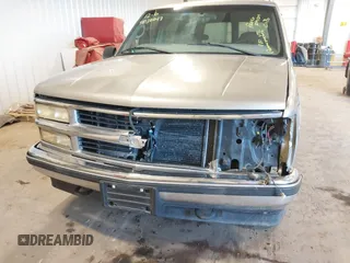 1999 Chevrolet Tahoe Z71 with VIN 1GNEK13R7XJ577796, listed as a IAAI auction lot 41036617 with 231,795 mi miles and . Bid and sale history available at DreamBid. Image 6.
